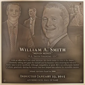 Bronze corporate Hall of Fame induction plaque featuring a multi-image etched montage of an executive.