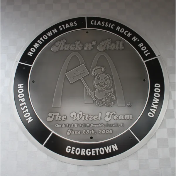Large Circular Brushed Aluminum Logo Plaque with Custom Corporate Branding and Black Recessed Border