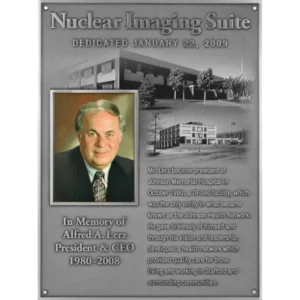 Cast aluminum hospital wing dedication plaque featuring a color executive portrait and etched architectural building renderings.