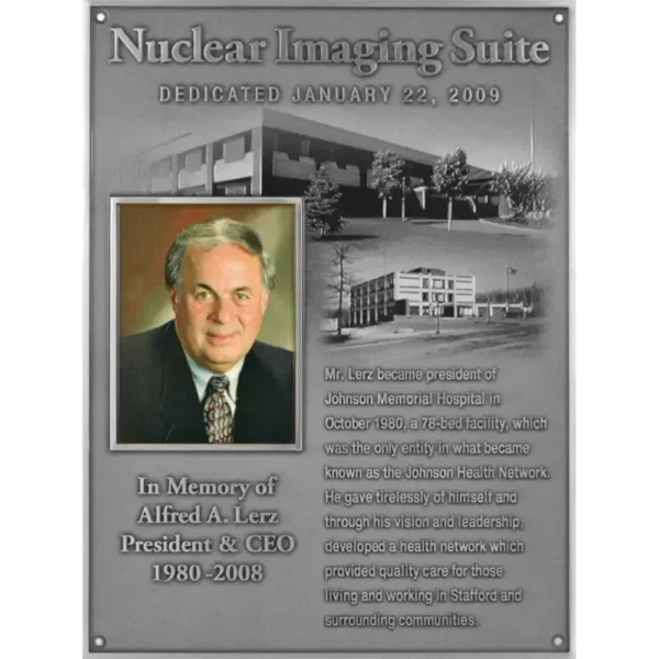 Cast aluminum hospital wing dedication plaque featuring a color executive portrait and etched architectural building renderings.