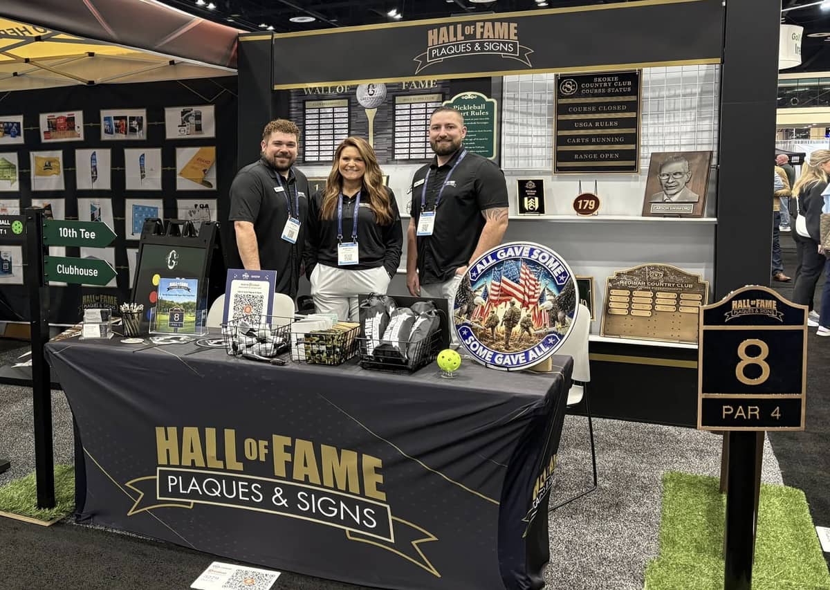 Hall of Fame employees at the Hall of Fame booth